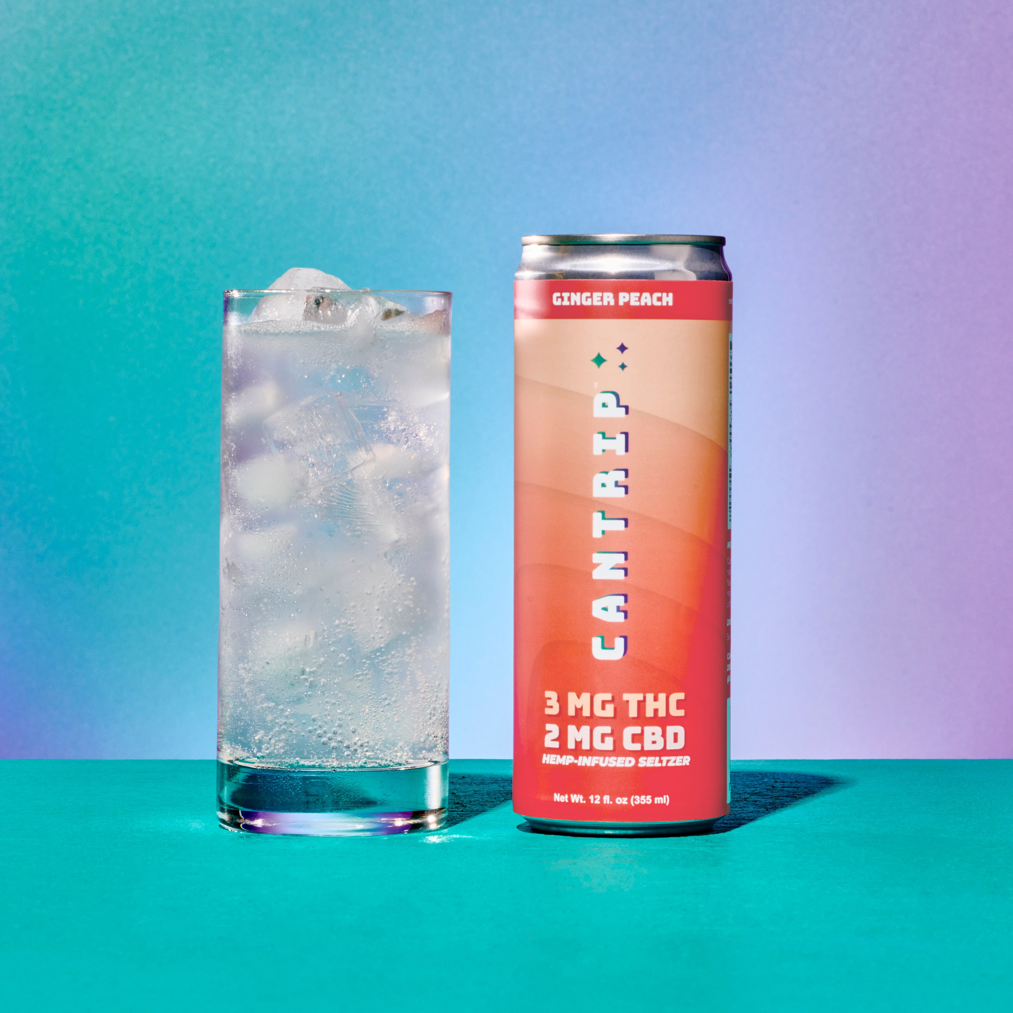 A peach-colored can of Cantrip Ginger Peach THC Seltzer next to a glass filled with seltzer and ice. The can reads,