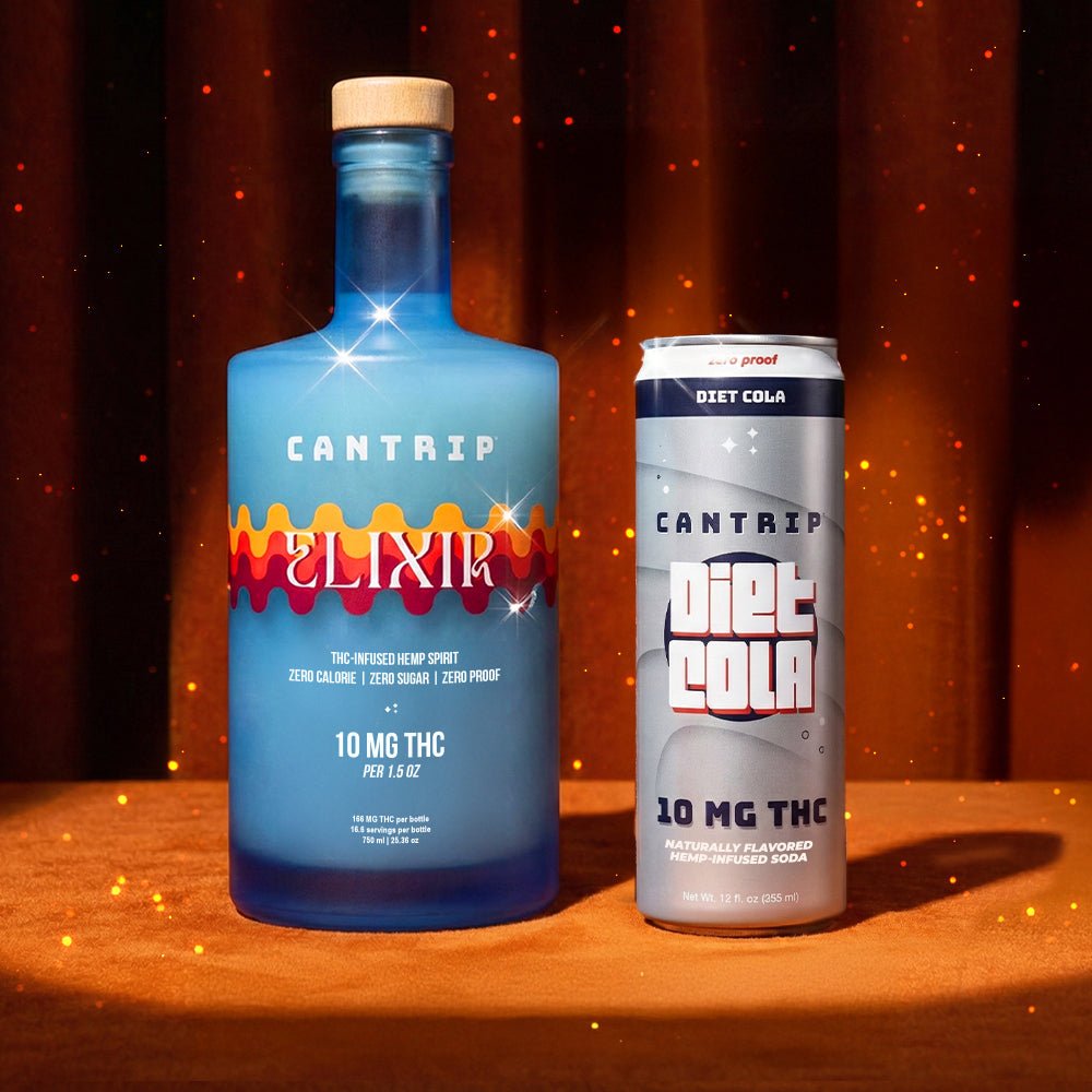 A blue bottle of Cantrip Elixir and a tall can of Cantrip Diet Cola sit on an oak table in front of a red stage curtain.