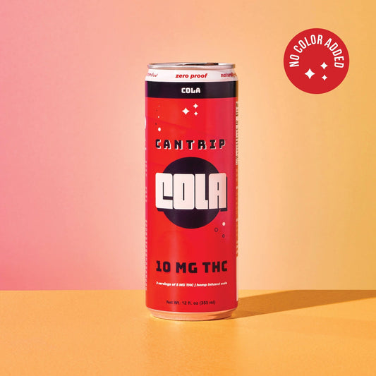 A red can of Cantrip 10 MG THC Cola sitting on an orange countertop. A red stamp says, "No color added."
