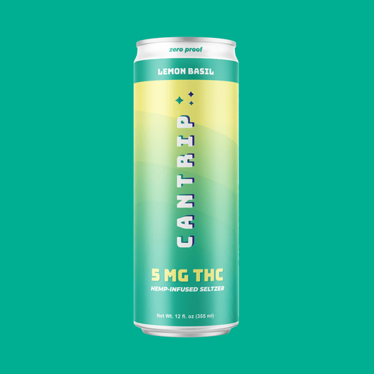 A green and yellow can of Cantrip Lemon Basil THC Seltzer (5 MG). The can reads, "Zero proof. 5 MG THC. Hemp-infused seltzer."